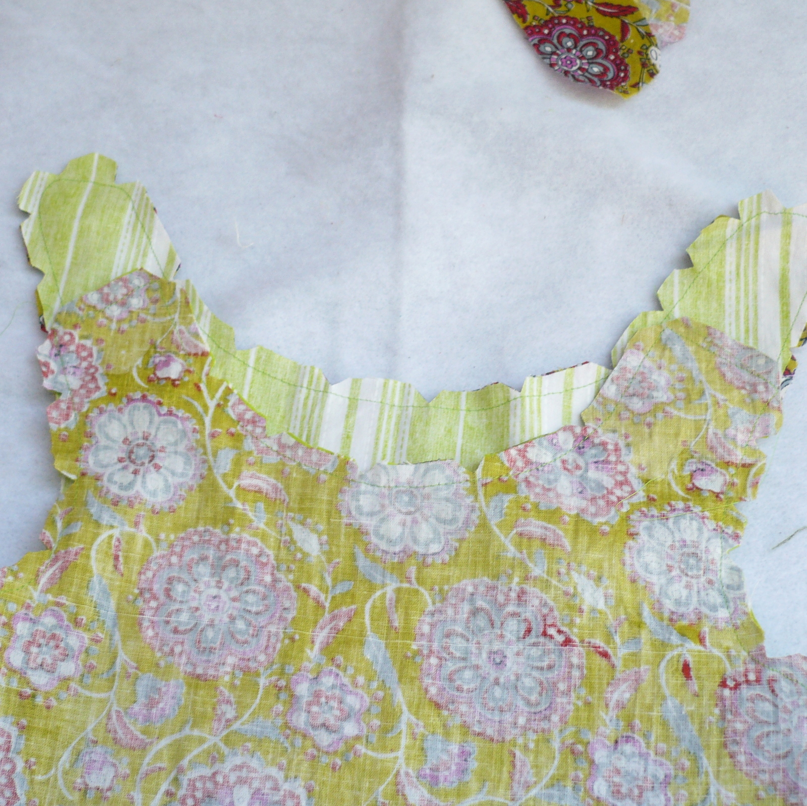 Now sew joining F1 and F2 starting at front of neckline