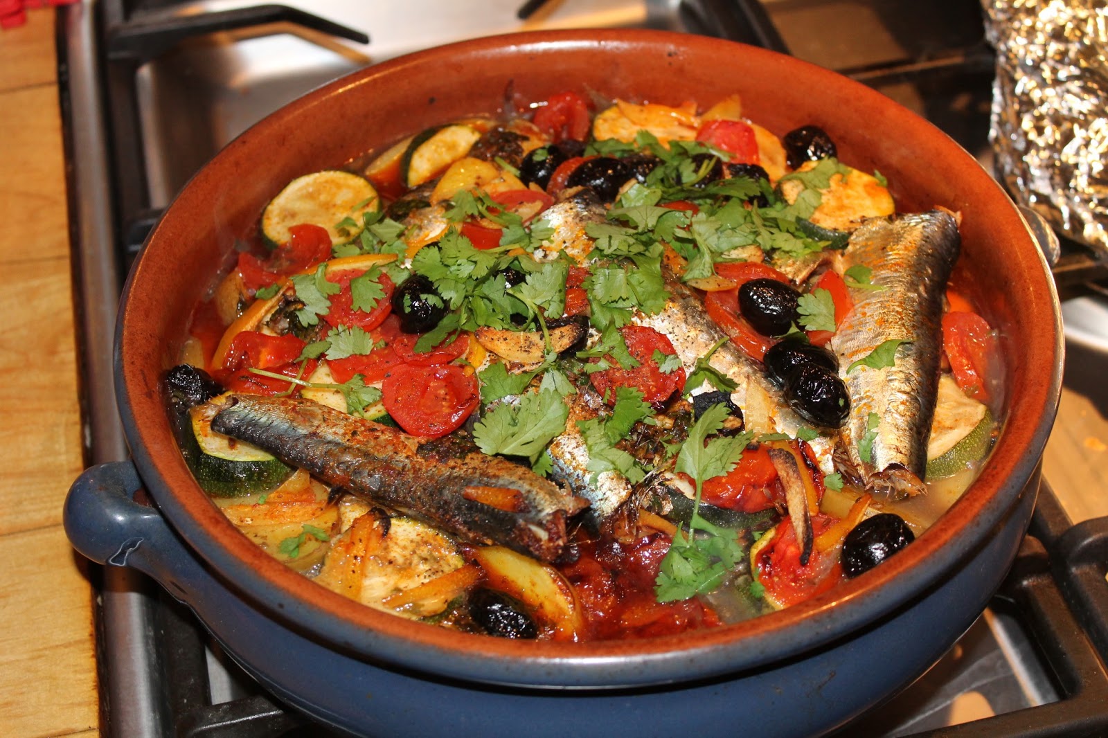 cook, serve, eat sardine and potato tagine