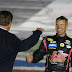 Clint Bowyer walks to victory lane at Charlotte