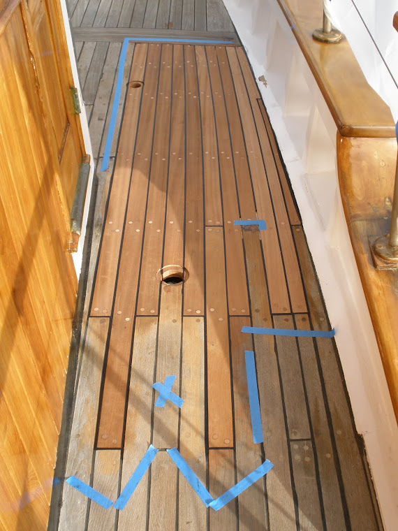 repaired rotted deck beams and replaced decking