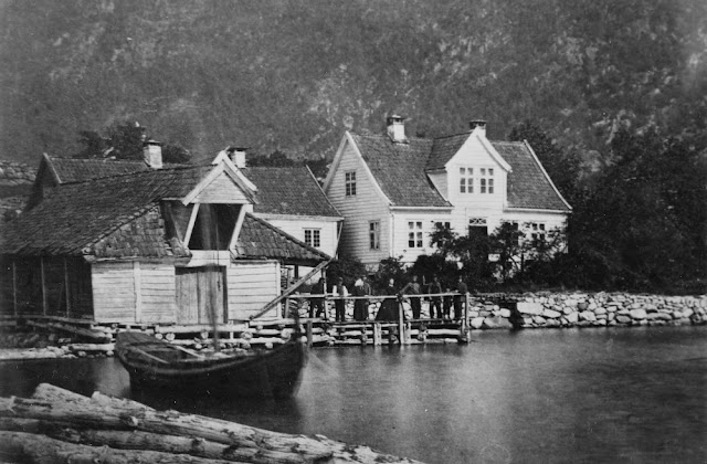This photo taken in 1877 shows the guest house on the right with accommodations for four  and the general store to the left.