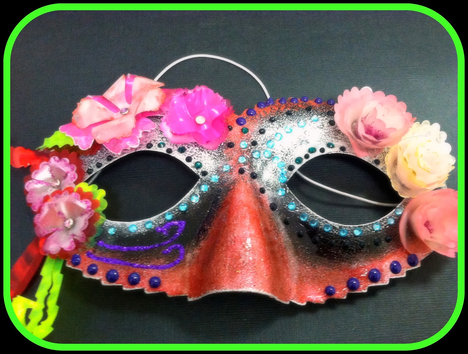 A Mask, Paint and Flowers...............