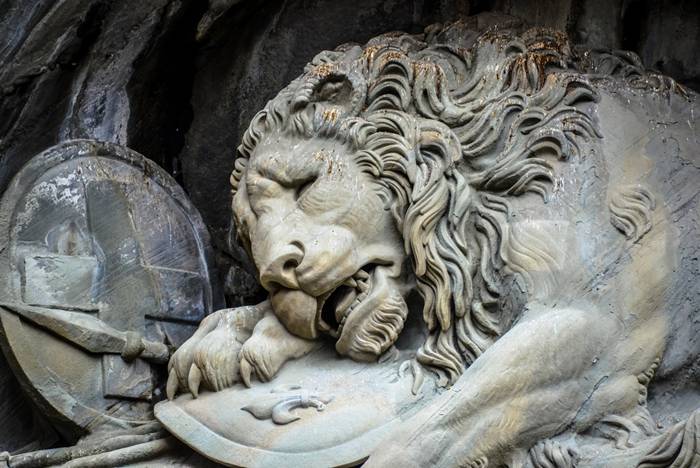 The Lion Monument, or the Lion of Lucerne, is a sculpture in Lucerne, Switzerland, designed by Bertel Thorvaldsen and hewn in 1820–21 by Lukas Ahorn. It commemorates the Swiss Guards who were massacred in 1792 during the French Revolution, when revolutionaries stormed the Tuileries Palace in Paris, France. Mark Twain praised the sculpture of a mortally-wounded lion as "the most mournful and moving piece of stone in the world."