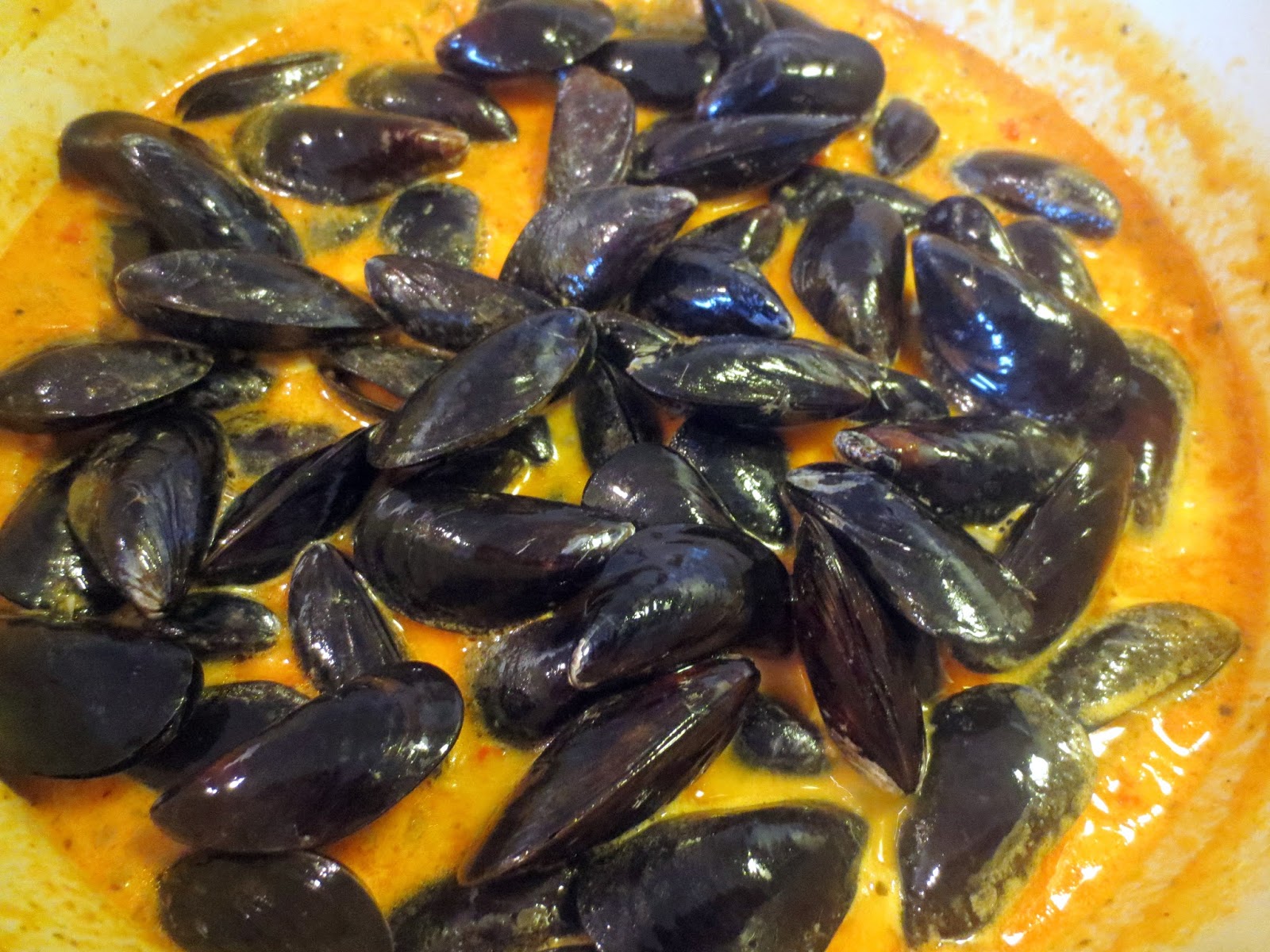 The Owl with the Goblet Spicy Thai Mussels with Chorizo in a Coconut