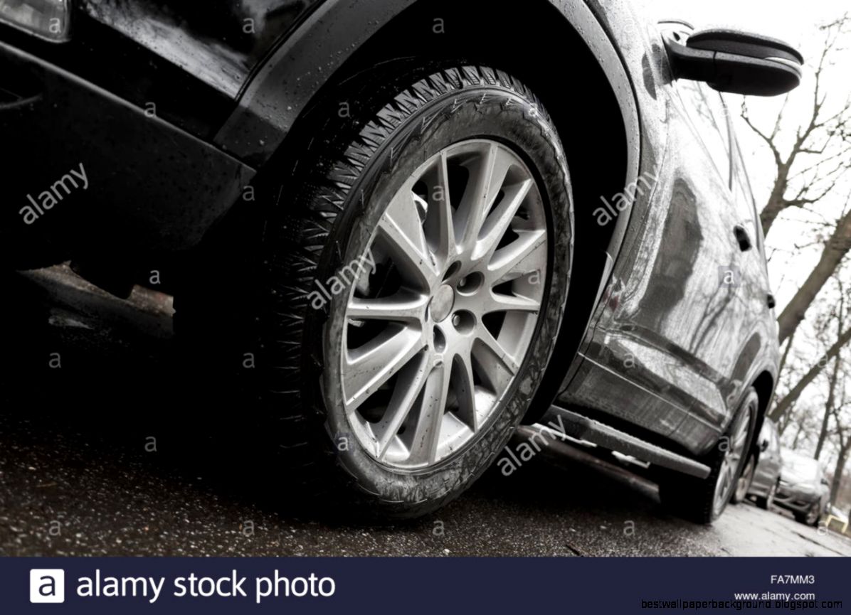 Closeup Wide Angle Photo Fragment Of Black Car Light Alloy Wheel Closeup Wide Angle Photo Fragment Of Black Car Light Alloy Wheel