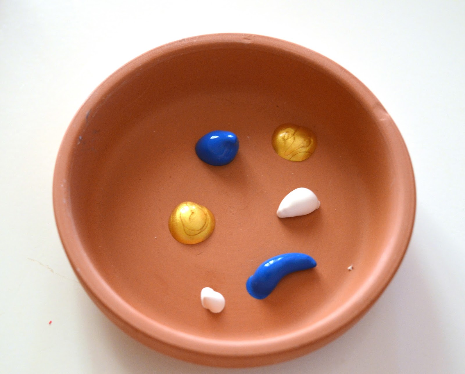 Painted terracotta coasters DIY! happy girly crafty