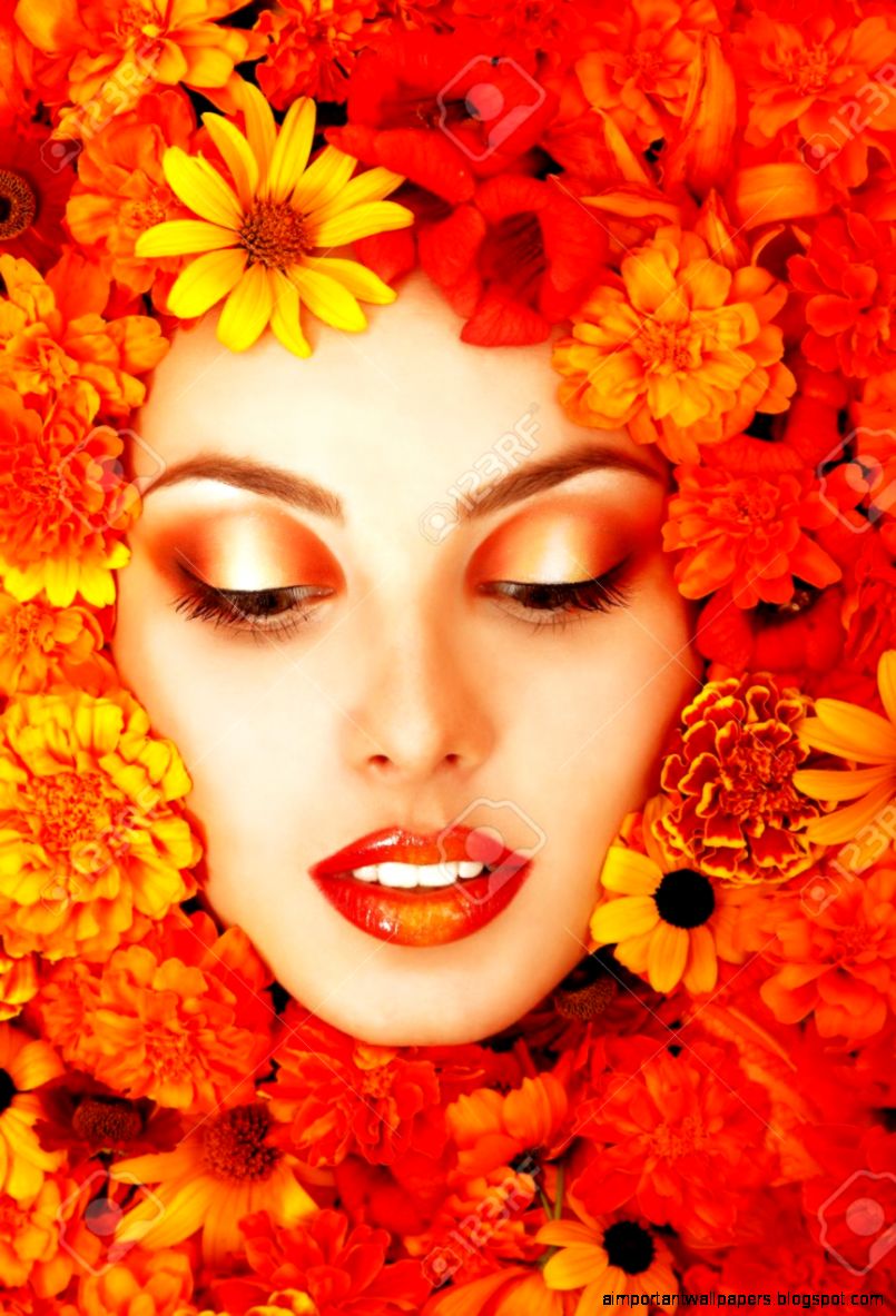 Beauty Portrait Of Beautiful Female Face With Orange Flowers Beauty Portrait Of Beautiful Female Face With Orange Flowers