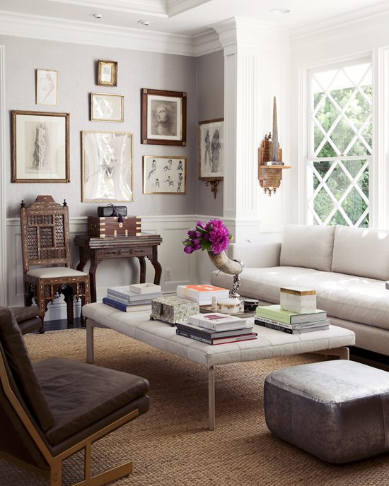 Contemporary white ottoman in an eclectic living room photographed by Michael Wells.