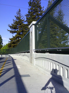 Shadow of pep crossing a bike-ped bridge over Hwy 85. (Narrative Clip)