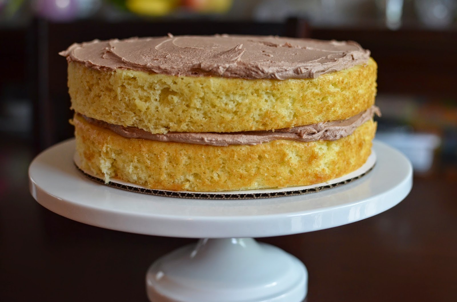 Playing with Flour Vanilla layer cake with chocolate buttercream frosting
