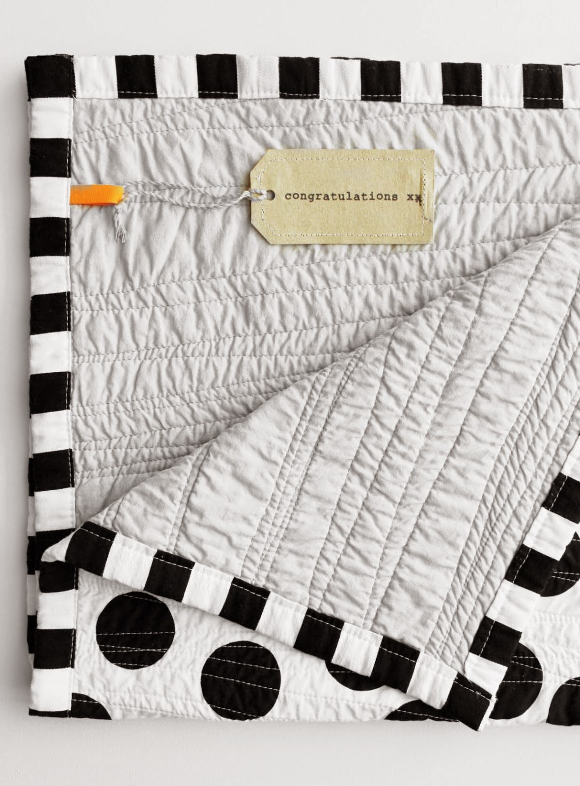 maker*land. Black and white baby quilt.