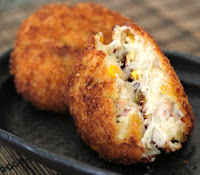 japanese cream croquettes mashed potatoes miixed with meat or seafood.