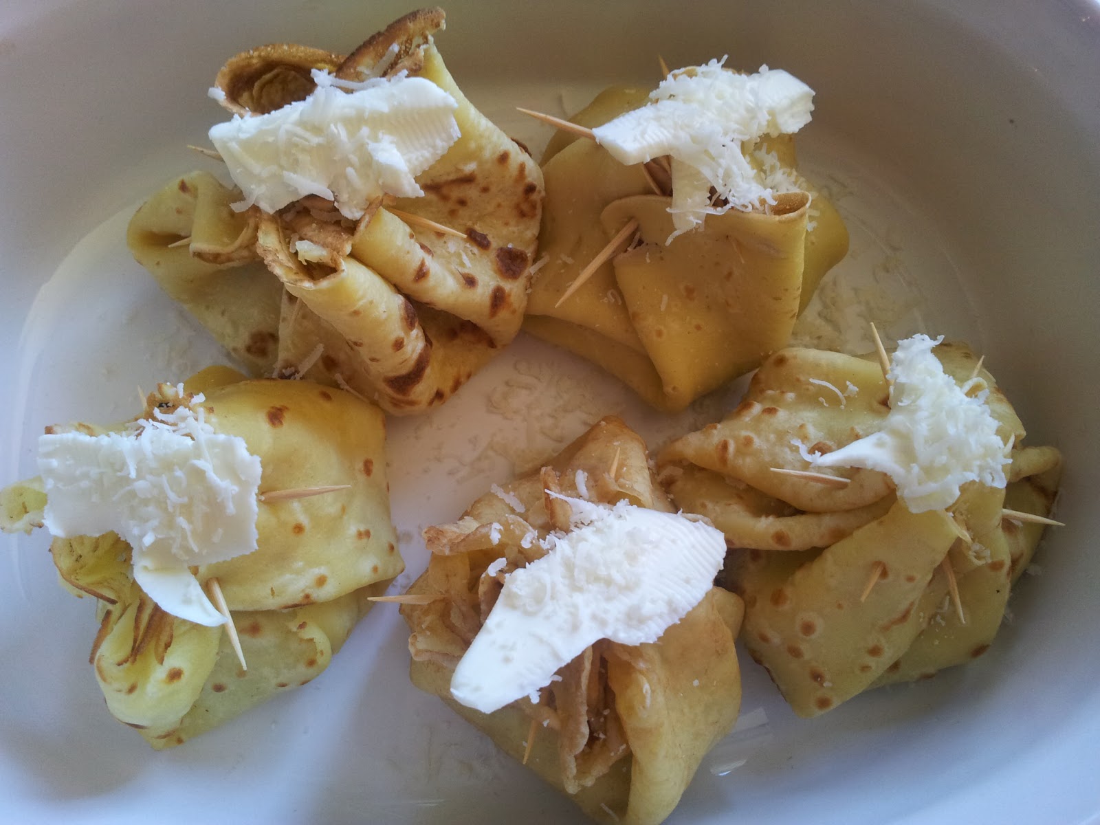 Sacchetti di crepes con patate e porcini nella "fonduta" Cucino... ma
