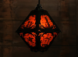 Vintage style silhouette Halloween lantern featuring art by Robert Aaron Wiley