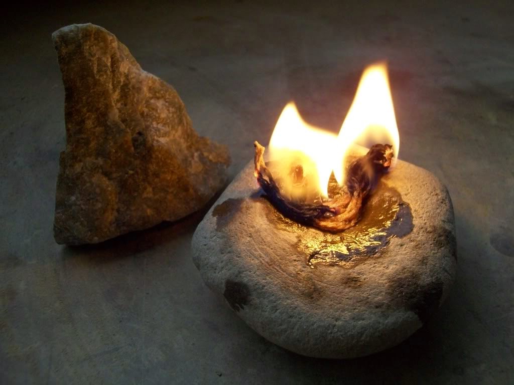 Goblin Ranger Crafting a Primitive Fat Lamp