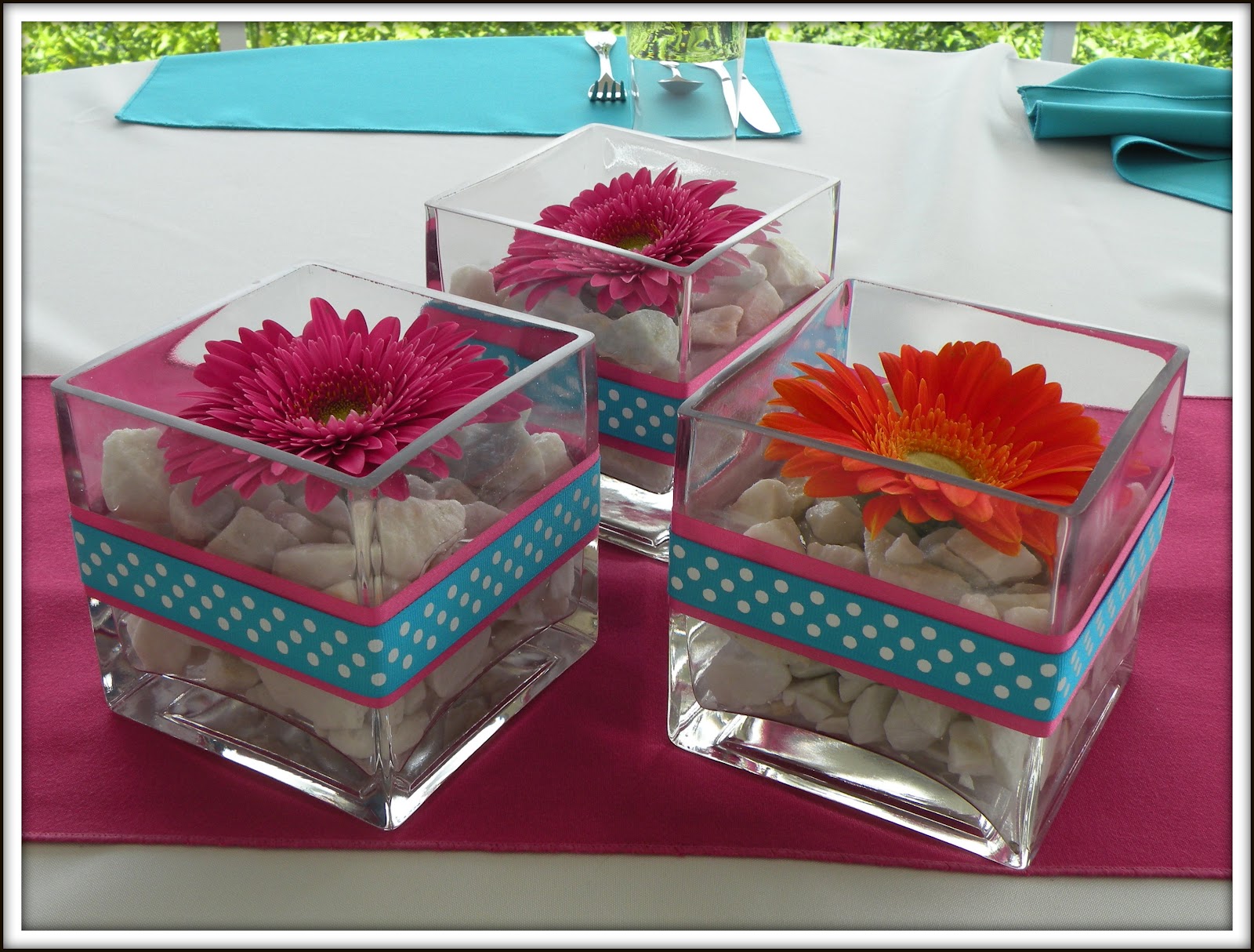 pink and orange daisy centerpieces