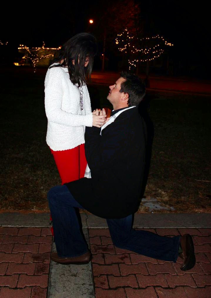 winter proposal with Christmas lights, Ryan Martin and Leslie Lukens, engagement