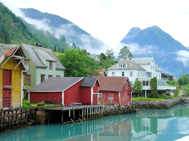 A similar view of the enchanting village of Fjærland shows not much has changed in 100 years. The white building in the background is the Fjærland Fjordstuer Hotel. Photo: EuroTravelogue™.