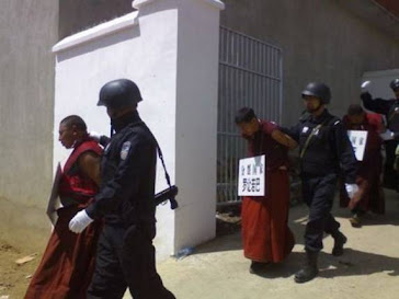 Chinese cops arrested Tibetan monks.