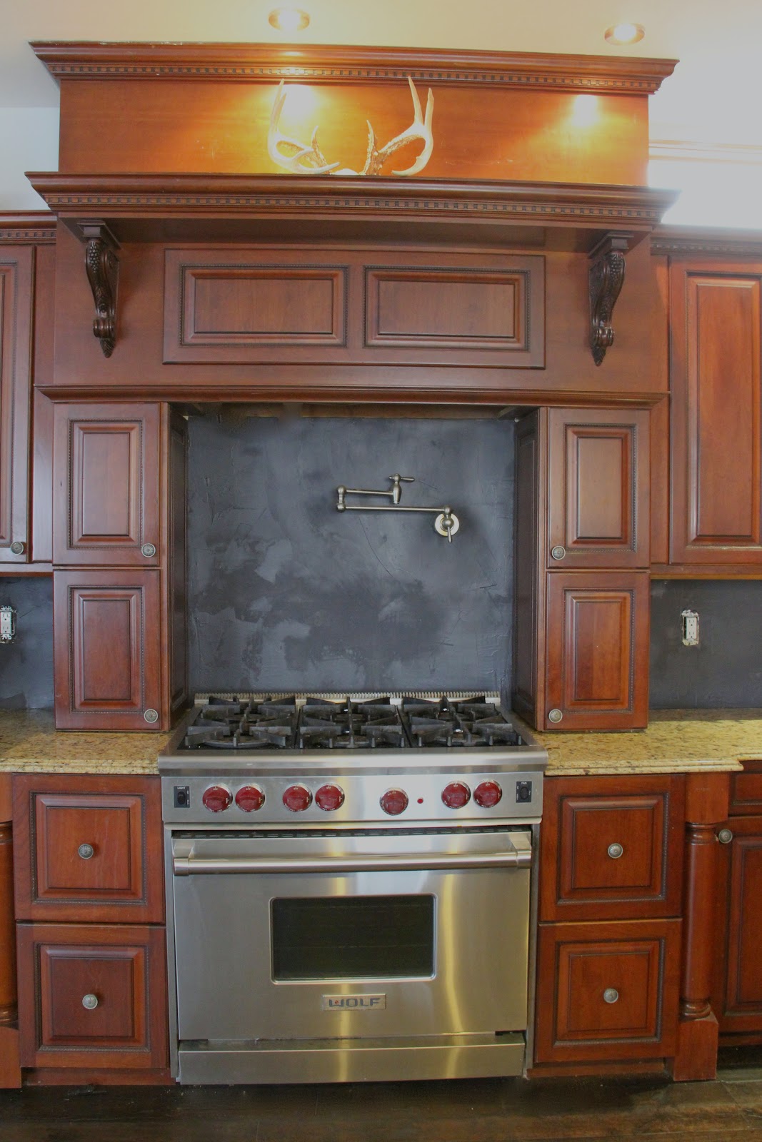 Sheer Serendipity Charcoal black plaster backsplash