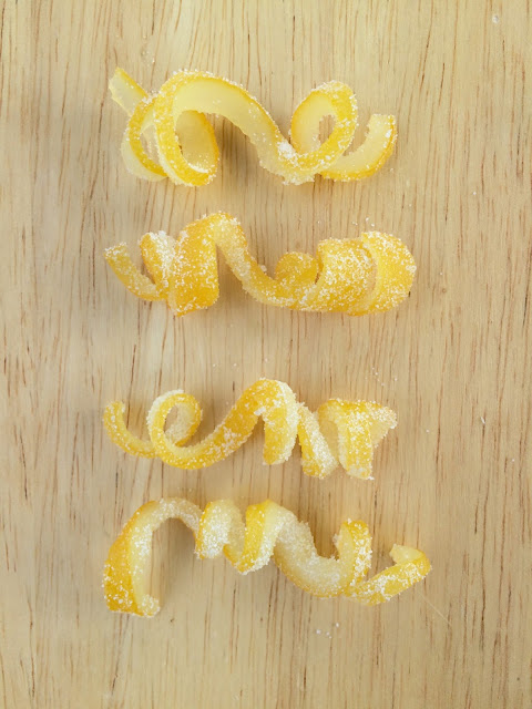 Candied lemon twists - perfect garnish for tea, cocktails or sparkling water and makes a great gift! | www.jacolynmurphy.com