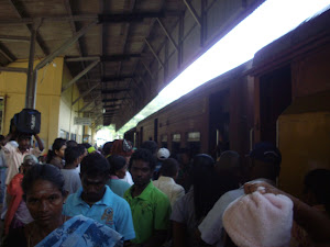 Boarding the packed "Third Class Compartment of  the train at Nanu Oye station.