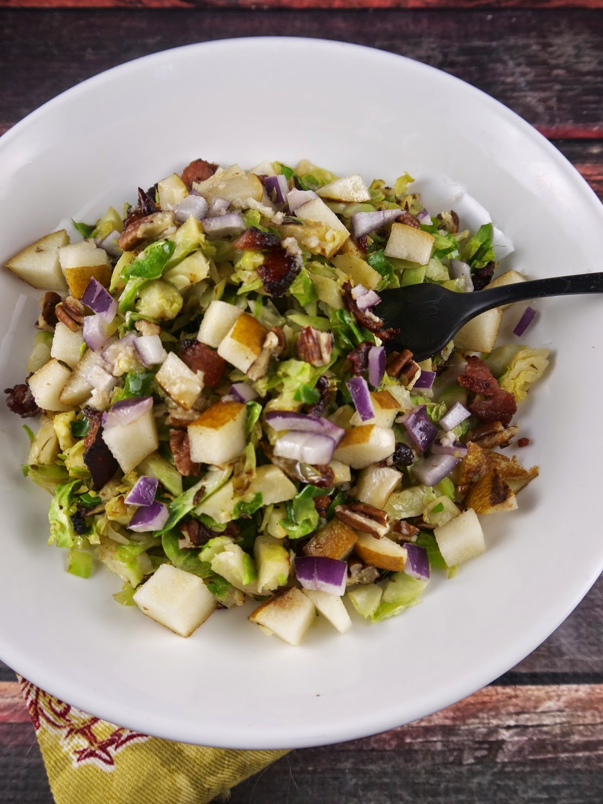 Paleo Brussels Sprouts Slaw with Warm Bacon Dressing the preppy paleo