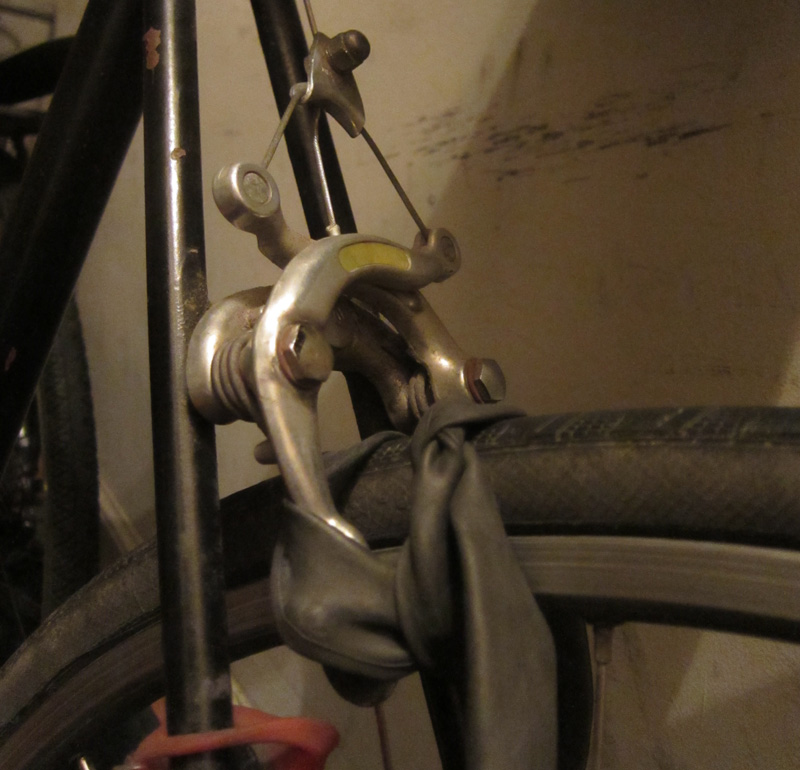 Ode Street Tribune old bike inner tube helps to repair brakes