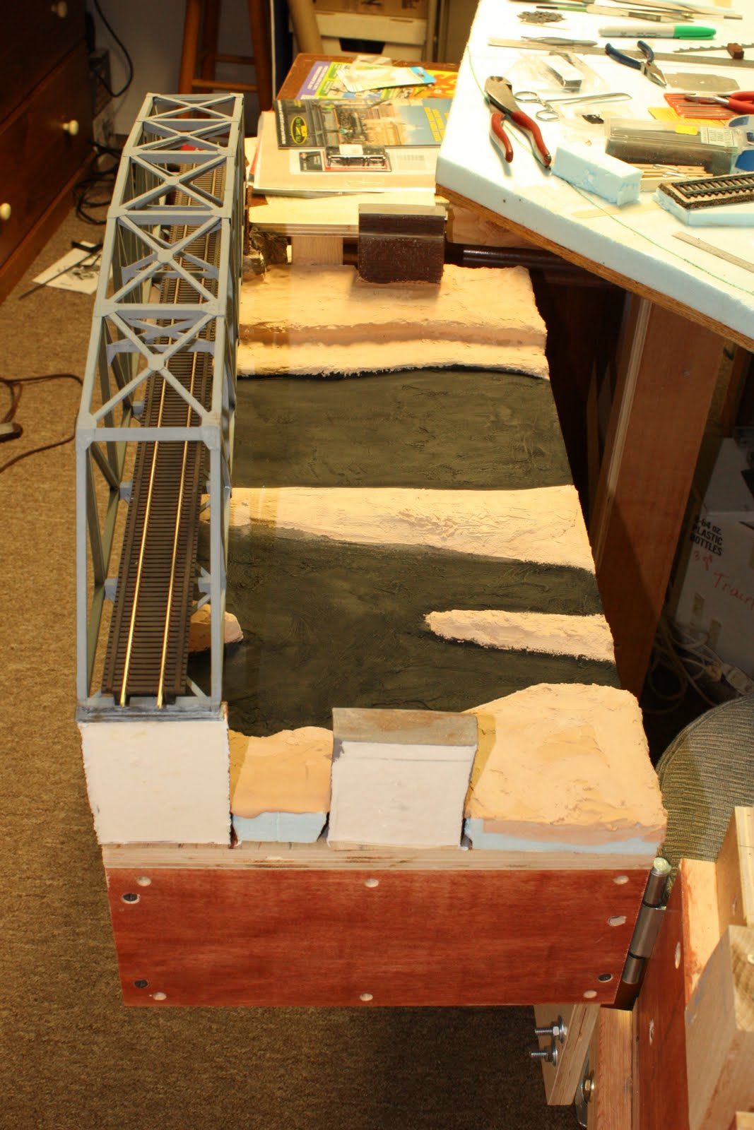 Dean's Model Railroad Building a swing gate with bridges.
