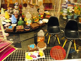 Dolls' house miniature food items on display at  dolls' house shop.