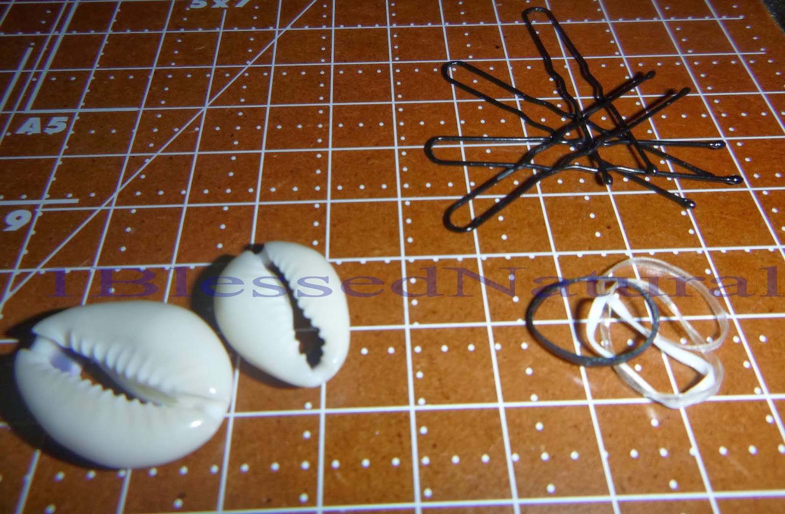 How to Put Cowrie Shells in Natural Hair