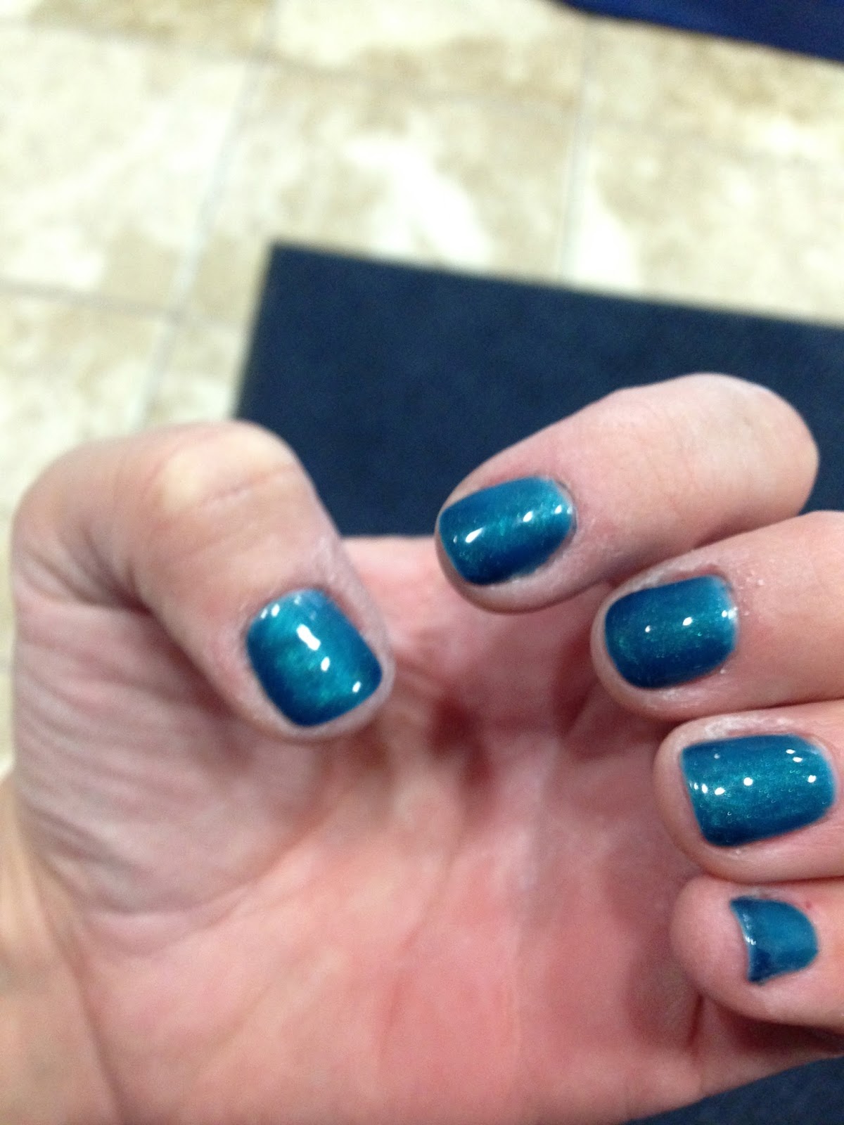 Poppy Dabbles Rock Climbing with a Gel Manicure