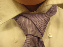He mastered the backwards tie knot!