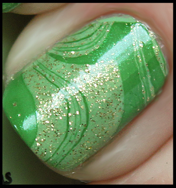 WATER MARBLING: is when you drop droplets of nail polish into