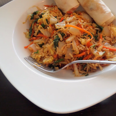 Spicy Vegetable Fried Rice:  A spicy fried rice made from leftovers.  Main ingredients are cabbage, onion, bok choy, and carrot, plus eggs for protein.