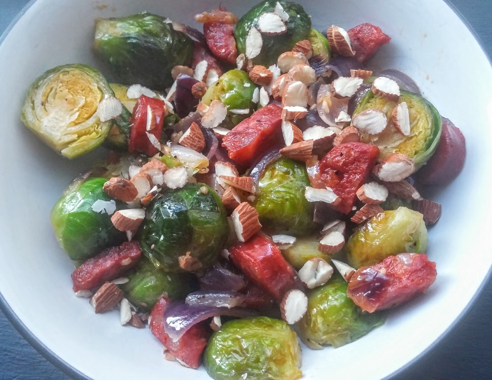 sprouts with chorizo red onion and almonds 
