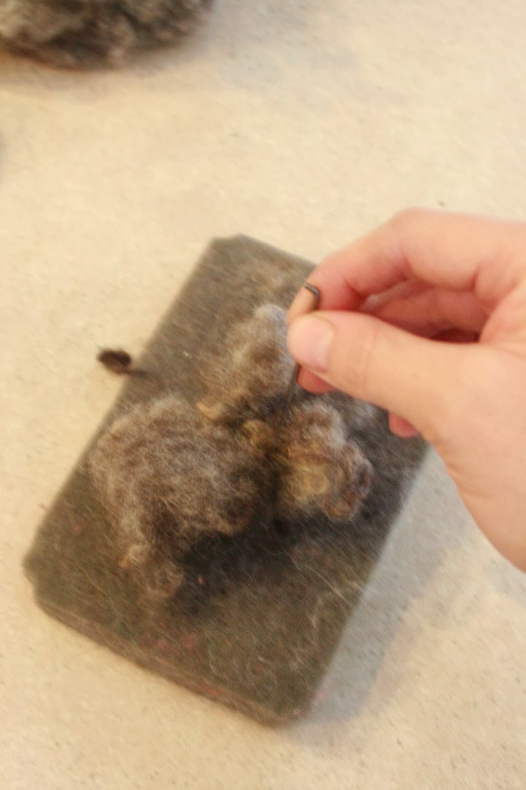a needle felted mousy friend. June Cleaver in yoga pants