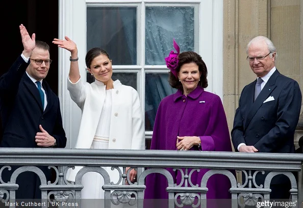 King Carl XVI Gustaf of Sweden and Queen Silvia of Sweden with Crown Princess Victoria of Sweden and Prince Daniel, Duke of Vastergotland on the balcony at Amalienborg Palace during festivities for the 75th birthday of Queen Margrethe II Of Denmark 