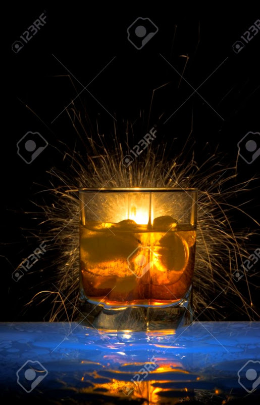 Glass With Against Bengal Fires With Reflexion In A Glass With Against Bengal Fires With Reflexion In A