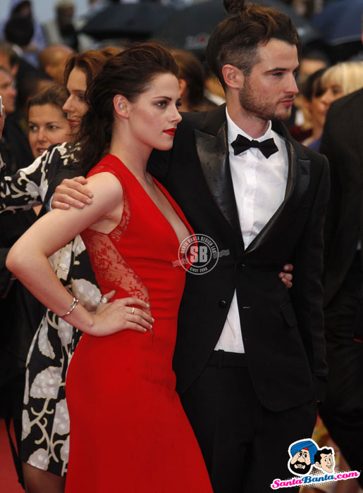 Actors Kristen Stewart and Tom Sturridge arrive on the red carpet ahead of the screening of the film 'Cosmopolis' in competition at the 65th Cannes Film Festival - (10) - Cannes Film Festival 2012 Pics
