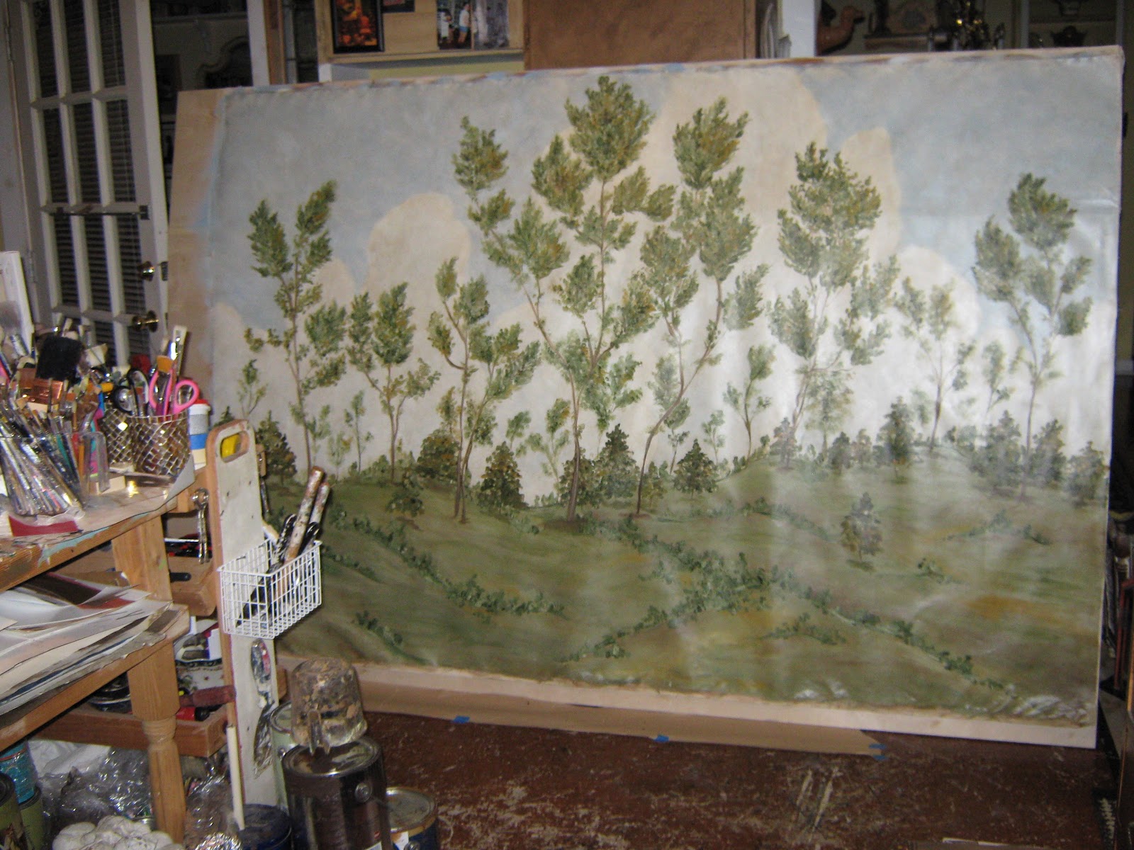 LYNDA BERGMAN DECORATIVE ARTISAN PAINTING A HUGE CANVAS TO COVER A
