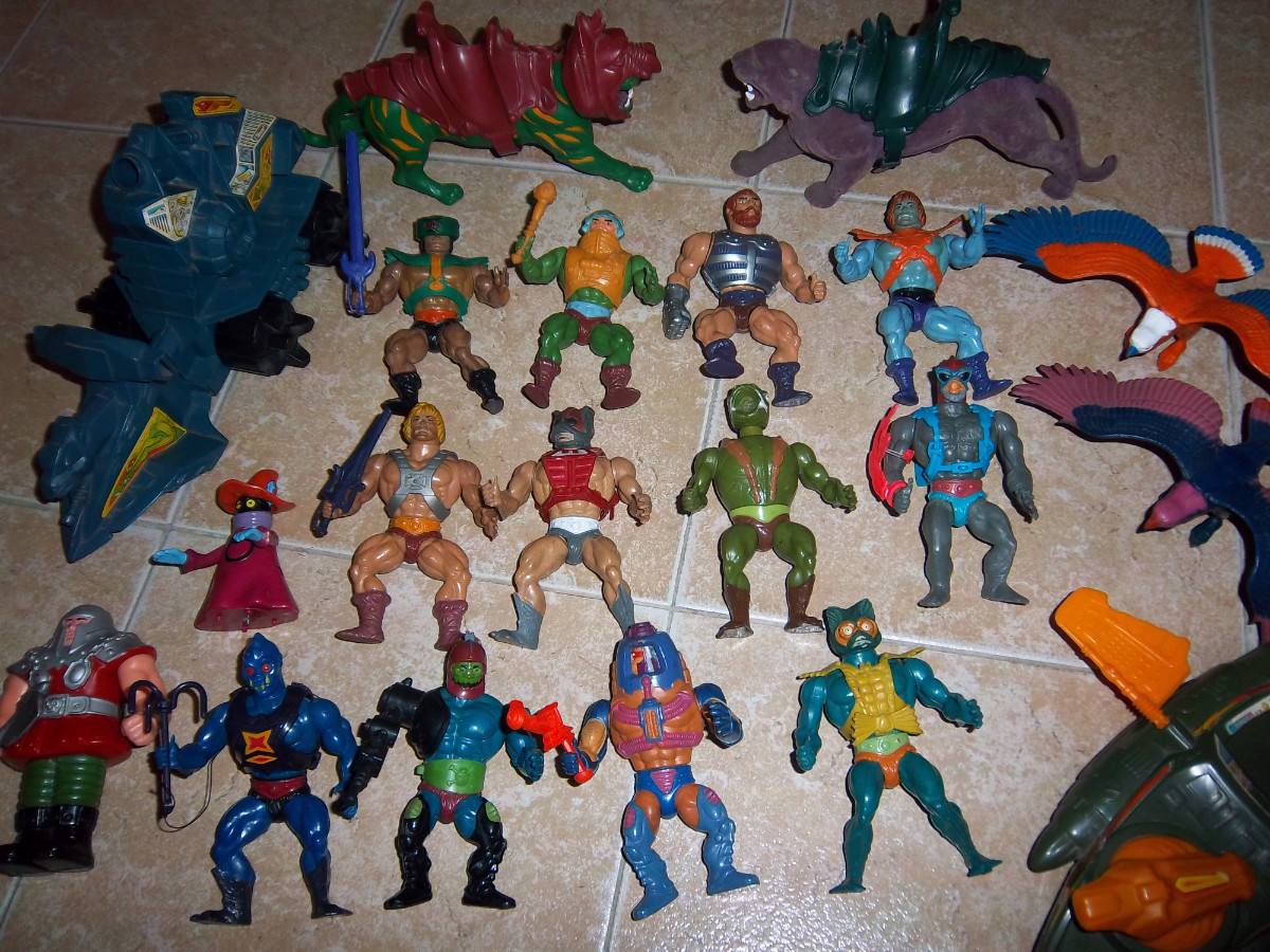 muñecos he man top toys