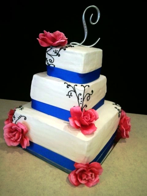 Pink and blue wedding cake Bridal Shower cake There's a black M on top but