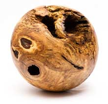wooden ball 2 feet in diameter with gaps in it