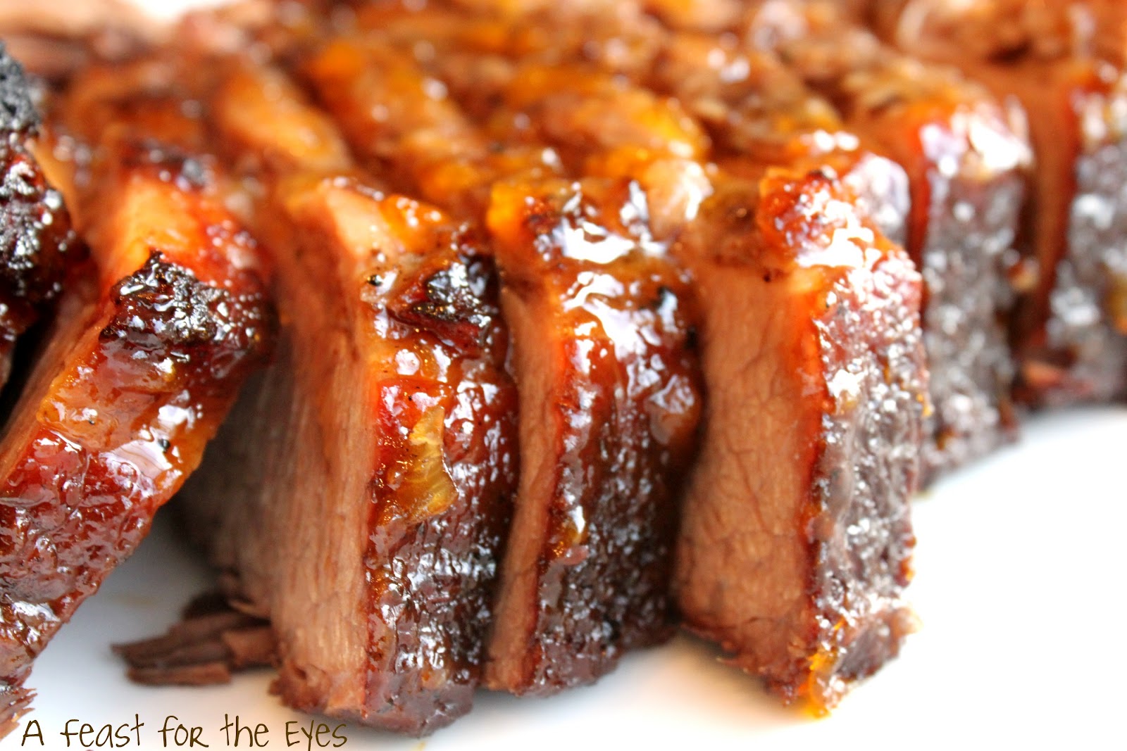 A Feast for the Eyes Braised Brisket with BourbonPeach Glaze