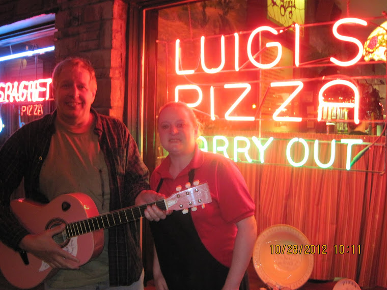 Gueeetar Dan and WEIRD pizza waitress girl at Luigis in Akron.