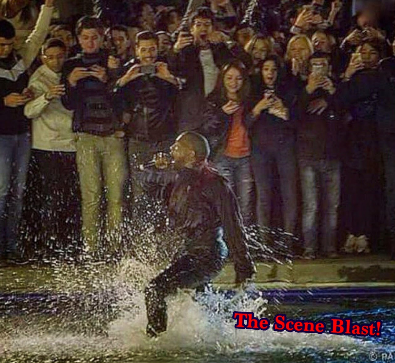 Kanye West seems to believe he can walk on water at Swan Lake