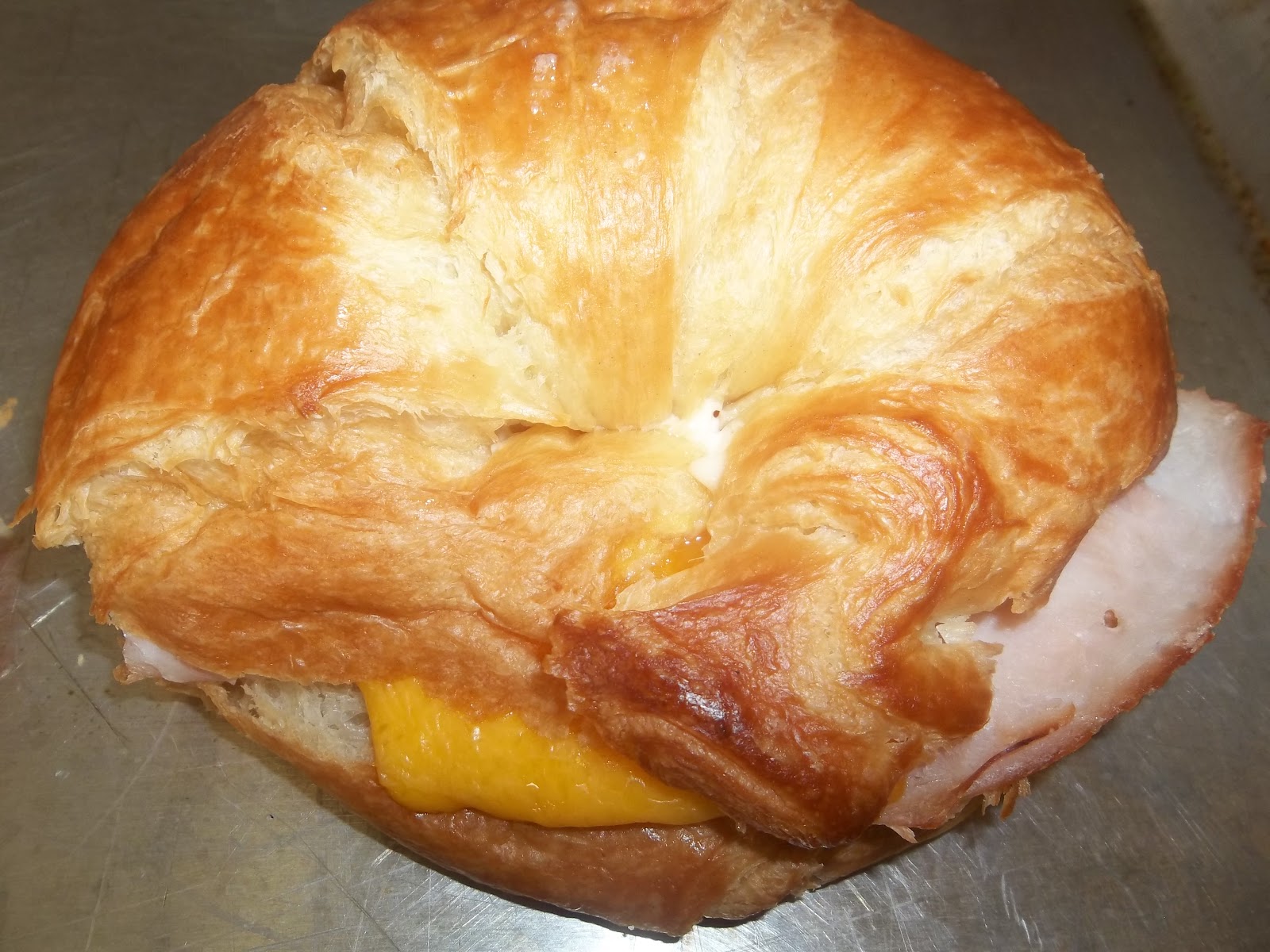 It's All About a Good Recipe Hot Turkey and Cheese on a Croissant