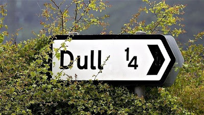 Dull road sign