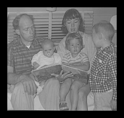 photo of: Debbie Clement as a Child: Family Reading Together